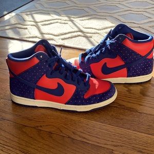 Red and blue Nikes with Triangle accents